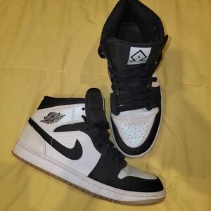 Nike Black and White Mid-Top Sneakers
